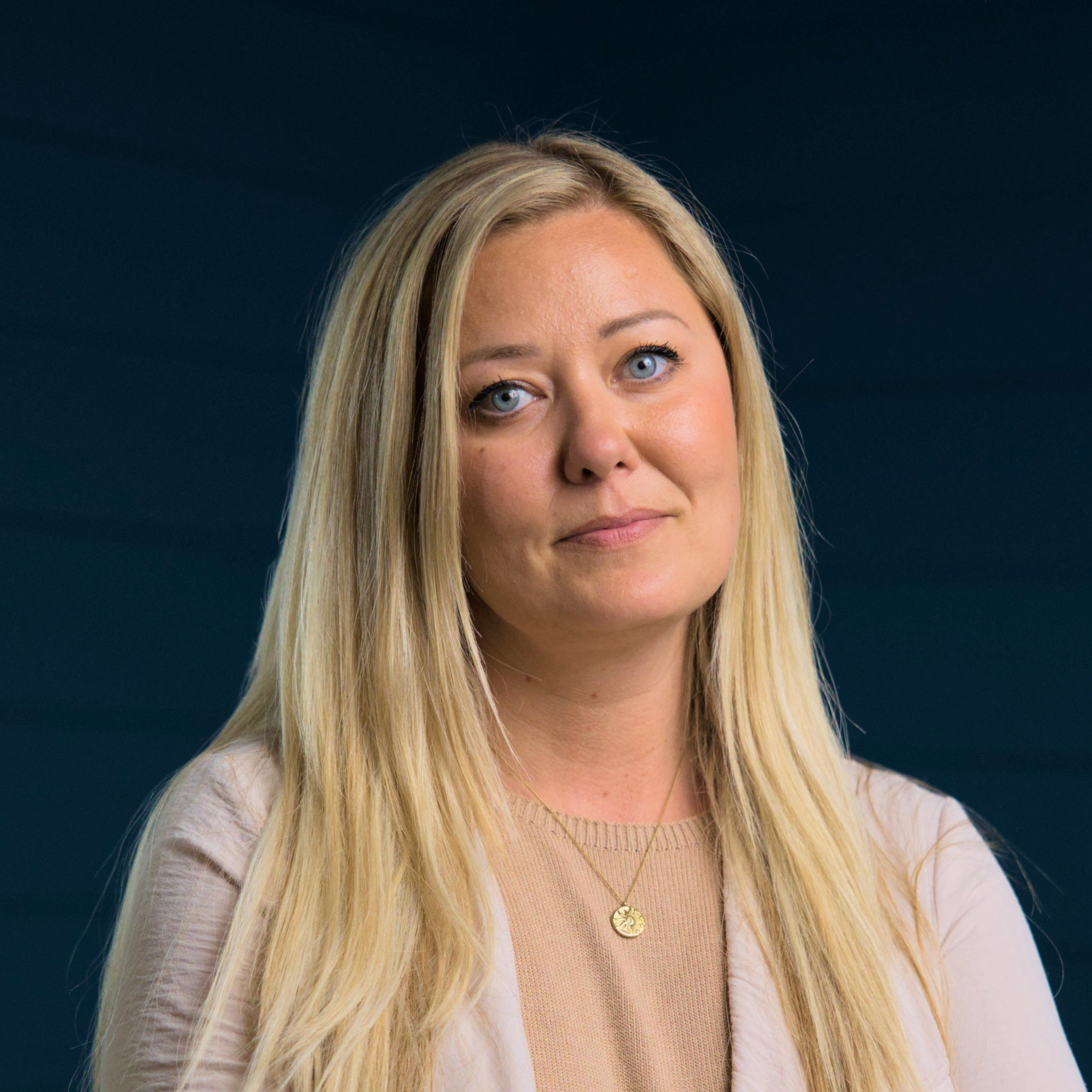 A professional headshot of Cassi Petersen.